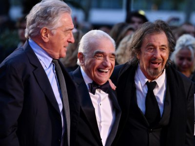 (De gauche à droite) Al Pacino, le réalisateur Martin Scorsese et Robert De Niro sur le tapis rouge de la première du film "The Irishman",  qui ne sera projeté dans les salles que durant 26 jours avant d'être diffusé par Netflix, qui le finance - DANIEL LEAL-OLIVAS [AFP/Archives]
