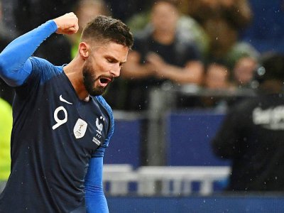 L'attaquant des Bleus Olivier Giroud exulte après avoir inscrit un but contre la Turquie en qualif de l'Euro-2020, le 14 octobre 2019 au Stade de France - MARTIN BUREAU [AFP/Archives]