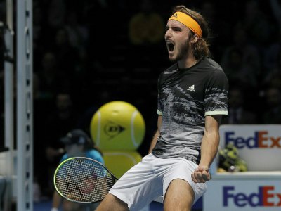 Le bonheur de Stefanos Tsitsipas vainqueur de Daniil Medvedev au Masters final de Londres, le 11 novembre 2019 - Adrian DENNIS [AFP]