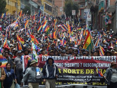Des partisans de l'ex-président bolivien Evo Morales manifestent à La Paz le 14 novembre 2019 - Aizar Raldes [AFP]