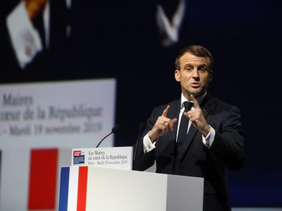 Le président Emmanuel Macron au congrès de l'Association des maires de France, à Paris, le 19 novembre 2019 - LUDOVIC MARIN [AFP]