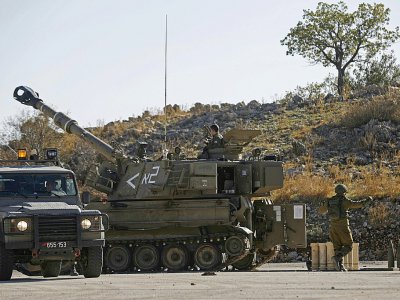 Des camions militaires israéliens stationnés près de la frontière avec la Syrie, le 19 novembre 2019 sur le plateau du Golan - JALAA MAREY [AFP]