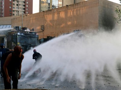 Affrontements entre manifestants et forces de l'ordre à Santiago, le 22 novembre 2019 - Martin BERNETTI [AFP]