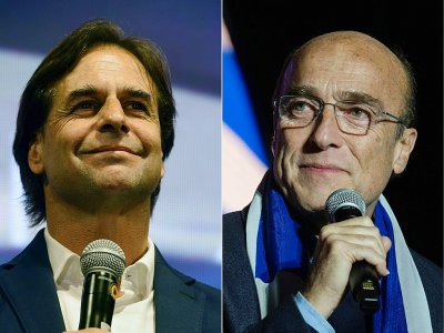 Les deux candidats au deuxième tour de l'élection présidentielle en Uruguay, Luis Lacalle Pou (g) et Daniel Martinez - EITAN ABRAMOVICH                    , PABLO PORCIUNCULA [AFP/Archives]