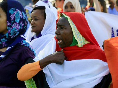 Des Soudanaises manifestent contre les violences faites aux femmes, à Khartoum le 25 novembre 2019 - Ashraf SHAZLY [AFP]