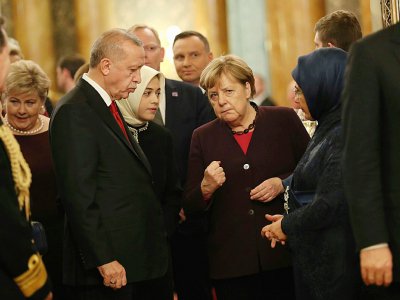 Le président turc Recep Tayyip Erdogan et la chancelière allemande Angela Merkel, pendant une réception à Londres à la veille du sommet de l'Otan le 3 décembre 2019 - Yui Mok [POOL/AFP]