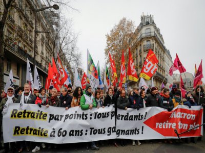 En tête du cortège peu avant le départ de la manifestation boulevard Magenta dans l'est de Paris, le 5 décembre 2019 - Thomas SAMSON [AFP]