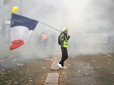 Un manifestant contre la réforme des retraites le 5 décembre 2019 à Paris - Zakaria ABDELKAFI [AFP]