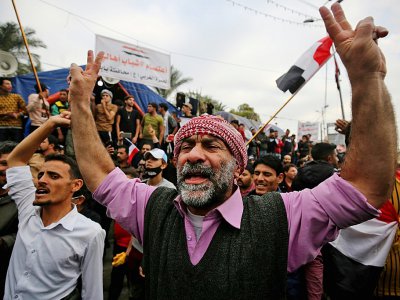 Des Irakiens manifestent contre le gouvernement dans la capitale Bagdad, le 6 décembre 2019 - AHMAD AL-RUBAYE [AFP]
