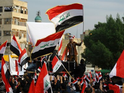 Des Irakiens manifestent sur la place Tahrir à Bagdad, le 6 décembre 2019 - AHMAD AL-RUBAYE [AFP]