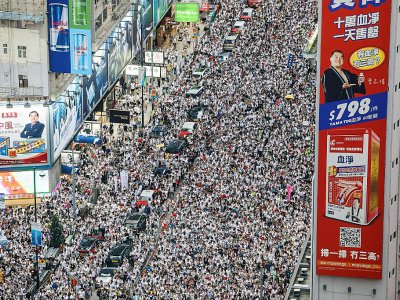 La manifestation contre le projet de loi sur l'extradition de Hong Kong vers la Chine le 9 juin 2019 - DALE DE LA REY [AFP/Archives]