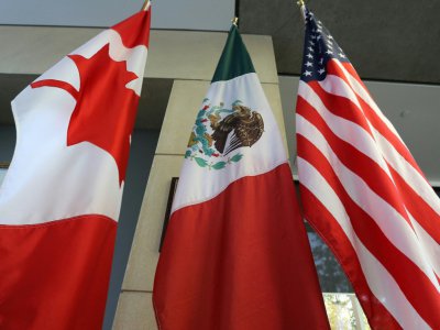 Les drapeaux canadien, mexicain et américain à Ottawa le 24 septembre 2017 - Lars Hagberg [AFP/Archives]