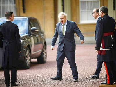 Boris Johnson quitte le Palais de Buckingham Palace après une audience avec la reine Elizabeth, le 13 décembre 2019 - Victoria Jones [POOL/AFP]