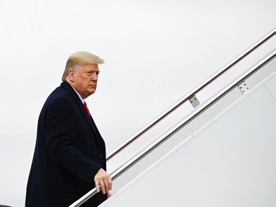 Le président américain Donald Trump monte à bord de Air Force One dans le Maryland, le 14 décembre 2019 - Andrew CABALLERO-REYNOLDS [AFP]