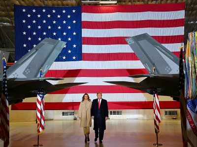 Le président américain Donald Trump accompagné de sa femme Melania Trump le 20 décembre 2019 à la Joint Base Andrews, dans le Maryland - Nicholas Kamm [AFP]