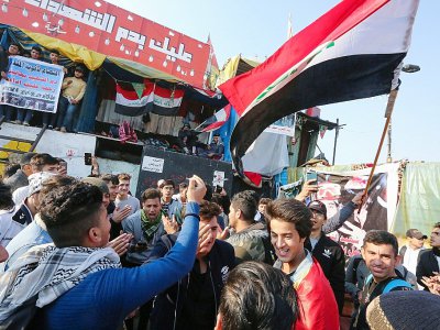 Des manifestants irakiens se rassemblent sur la place Tahrir à Bagdad, le 22 décembre 2019 - SABAH ARAR [AFP]