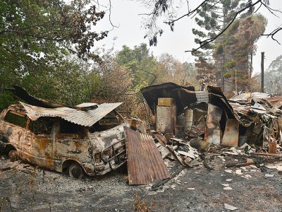 Voiture et maison calcinées à Bilpin le 29 décembre 2019 alors que des gigantesques incendies ont détruit des millions d'hectares en Australie - PETER PARKS [AFP]