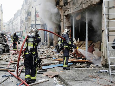 Intervention des pompiers après une explosion rue de Trévise à Paris le 12 janvier 2018 - Thomas SAMSON [AFP/Archives]