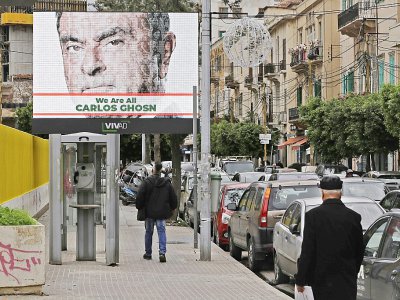 Une affiche de soutien à Carlos Ghosn dans une rue de Beyrouth, en décembre 2018 - JOSEPH EID [AFP/Archives]