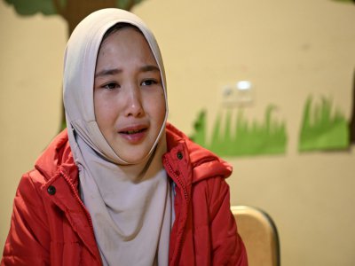 Fatima, une écolière ouïghoure de neuf ans, durant une interview avec l'AFP, le 29 novembre 2019 à Istanbul - Ozan KOSE [AFP]