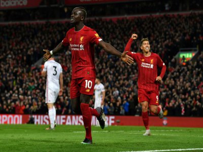 Le bonheur de Sadio Mané après avoir signé le 2e et dernier but de Liverpool dans son succès contre Sheffield United à Anfield, le 2 janvier 2020 - Paul ELLIS [AFP]