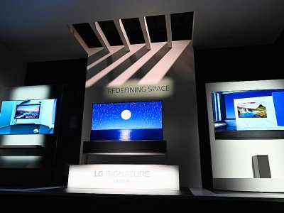 LG's latest LG GX series OLED 4 K and 8K television are seen at the LG press conference at the 2020 Consumer Electronics Show (CES) in Las Vegas, Nevada - Robyn Beck [AFP]