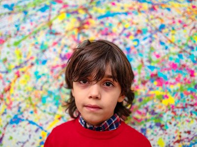 Au départ du talent de Mikail Akar: une toile et quelques pinceaux pour ses 4 ans. A Berlin le 13 décembre 2019 - John MACDOUGALL [AFP]