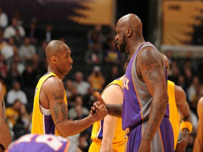 Kobe Bryant et Shaquille O'Neal, alors adversaires, en février 2009 à Los Angeles - ANDREW D. BERNSTEIN [NBAE / Getty Images/AFP]