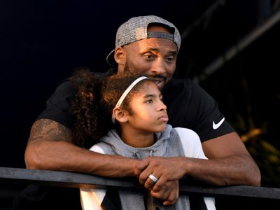 Kobe Bryant et sa 2e fille Gianna "Gigi" Bryant assistant àune compétition de natation à Irvine, en Californie, le 26 juillet 2018 - Harry How [Getty/AFP/Archives]