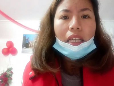 Capture d'écran de Aphinya Thasripech habitant à Wuhan, lors d'un appel vidéo le 29 janvier 2020 lancé aux autorités thaïlandaises - Handout [COURTESY OF APHINYA THASRIPECH/AFP]
