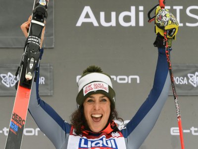 L'Italienne Federica Brignone exulte sur le podium après avoir remporté le super-G de Sotchi, le 2 février 2020 - Dimitar DILKOFF [AFP/Archives]