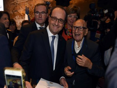 François Hollande et Simon Coencas le 10 décembre 2016 à Lascaux - Mehdi FEDOUACH [AFP/Archives]