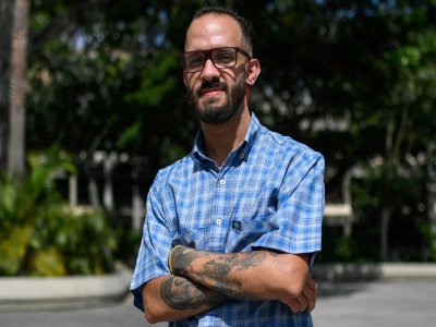 Carlos Rodriguez, graphiste, dans les rues de Caracas, le 9 août 2019. - Federico PARRA [AFP/Archives]