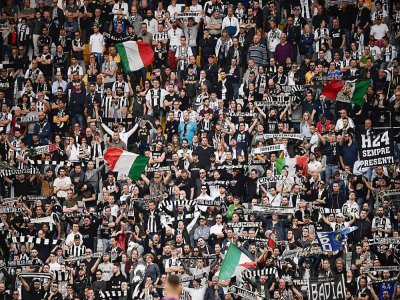 Des supporters de la Juventus lors d'un match contre la Fiorentina, le 20 avril 2019 à Turin - Marco Bertorello [AFP/Archives]
