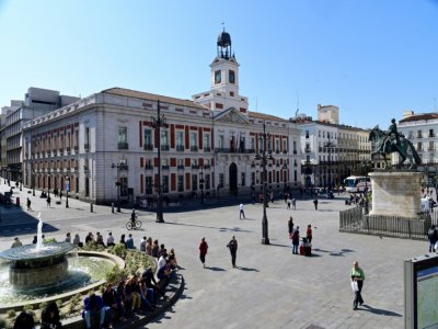 La Puerta del Sol au centre de Madrid, habituallement bondée, est désertée en raison de l'épidémie de coronavirus - JAVIER SORIANO [AFP]