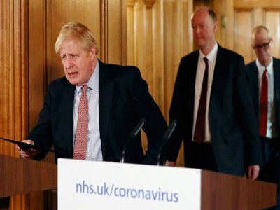 Le Premier ministre britannique Boris Johnson avant une conférence de presse, le 12 mars 2020 à Londres - SIMON DAWSON [POOL/AFP]
