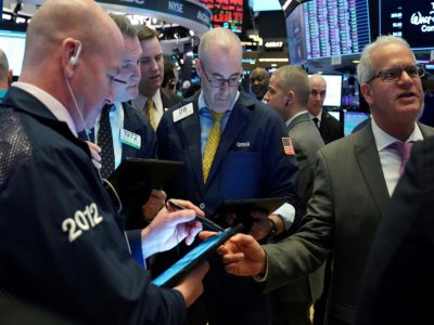 Des traders à la Bourse de New York, le 13 mars 2020 - Bryan R. Smith [AFP]