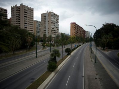 L'avenue Andalucia, habituellement très fréquentée, est déserte le 15 mars 2020 à Malaga (Espagne) - JORGE GUERRERO [AFP]