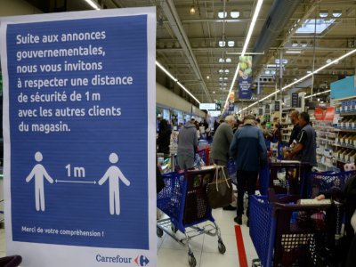 Dans un supermarché à Mérignac en Gironde, le 16 mars 2020 - MEHDI FEDOUACH [AFP]