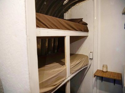 Des lits superposés dans un bunker à Fortitude Ranch, le 13 mars 2020 à Mathias, en Virginie occidentale - NICHOLAS KAMM [AFP]