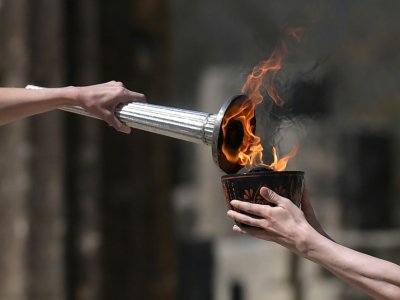 La cérémonie d'allumage de la flamme olympique dans le stade antique d'Olympie, le 12 mars 2020 en Grèce - ARIS MESSINIS [AFP/Archives]