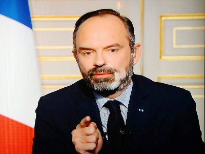 Capture d'écran du Premier ministre Edouard Philippe en duplex sur France 2 depuis Matignon, le 17 mars 2020 à Paris - Ludovic Marin [AFP]