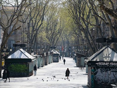 Les Ramblas à Barcelone, quasi-déserts, le 19 mars 2020 - Josep LAGO [AFP]