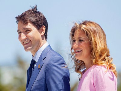 Le Premier ministre canadien Justin Trudeau (g) et son épouse Sophie Grégoire Trudeau le 8 juin 2018 à La Malbaie (Québec) - GEOFF ROBINS [AFP/Archives]