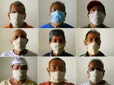 Après avoir martelé que les masques étaient inutiles contre le coronavirus quand on n'est pas malade, le discours officiel a changé - MARVIN RECINOS [AFP/Archives]
