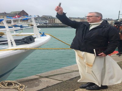 La bénédiction des bateaux dans le port par l'évêque du Havre, Monseigneur Jean-Luc Brunin. - DP