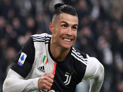 L'attaquant vedette de la Juventus Turin, le Portugais Cristiano Ronaldo, savoure son troisième but inscrit face à Cagliari, en championnat d'Italie le 6 janvier 2020 à Turin. - Marco Bertorello [AFP/Archives]