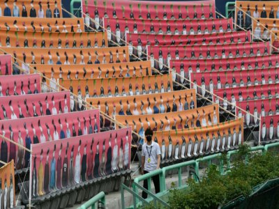 Bannières représentants des spectateurs pour la reprise du championnat de baseball dans des stades vides en Corée du Sud, le 5 mai 2020 - Jung Yeon-je [AFP]