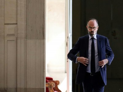 Le Premier ministre Edouard Philippe arrive à l'Assemblée nationale pour une séance de questions au gouvernement, à Paris le 14 avril 2020 - Stephane LEMOUTON [POOL/AFP]