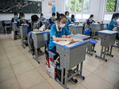 Reprise des cours pour les lycéens, le 6 mai 2020 à Wuhan, en Chine - STR [AFP]
